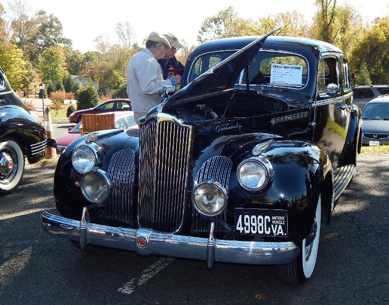 Image 044.JPG - Doug Richardson's 1941 120 Touring Sedan being judged by Jim Fulghum and Tom Brooks.  Bob Robb photo.